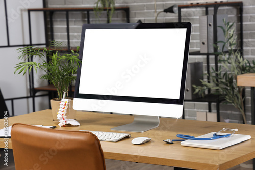 Modern workplace of doctor with computer in clinic