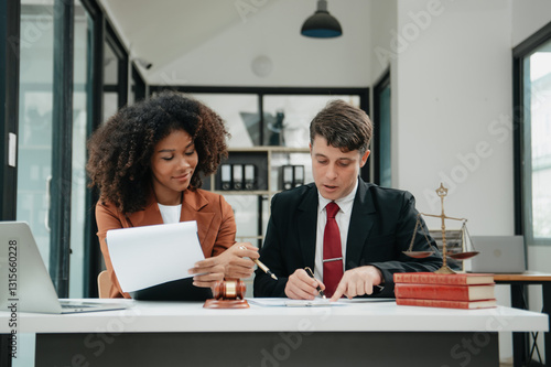 business team and lawyers discussing contract papers sitting at the table. Concepts of law, advice, legal services. at office