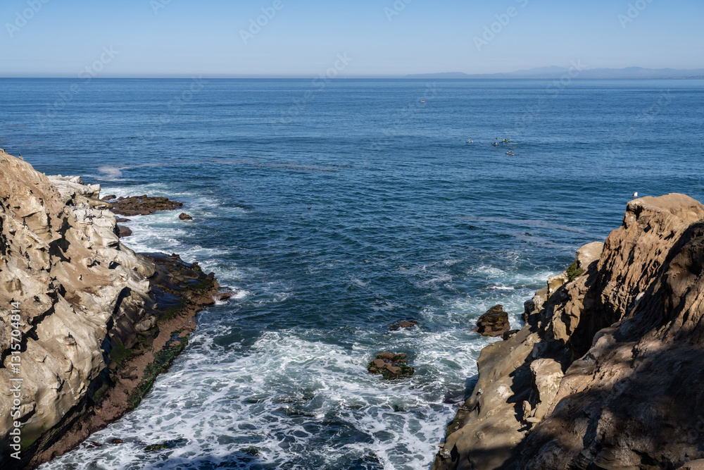 La Jolla Cove is a small cove with a beach that is surrounded by cliffs in La Jolla, a community of San Diego, California. La Jolla Cove is a small cove with a beach that is surrounded by cliffs in La Jolla, a community of San Diego, California.
