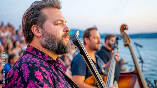 Musicians Perform by the Water at an Outdoor Concert During Sunset