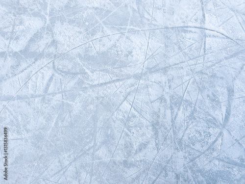 Ice background with marks from skating and hockey. Ice hockey rink scratches surface