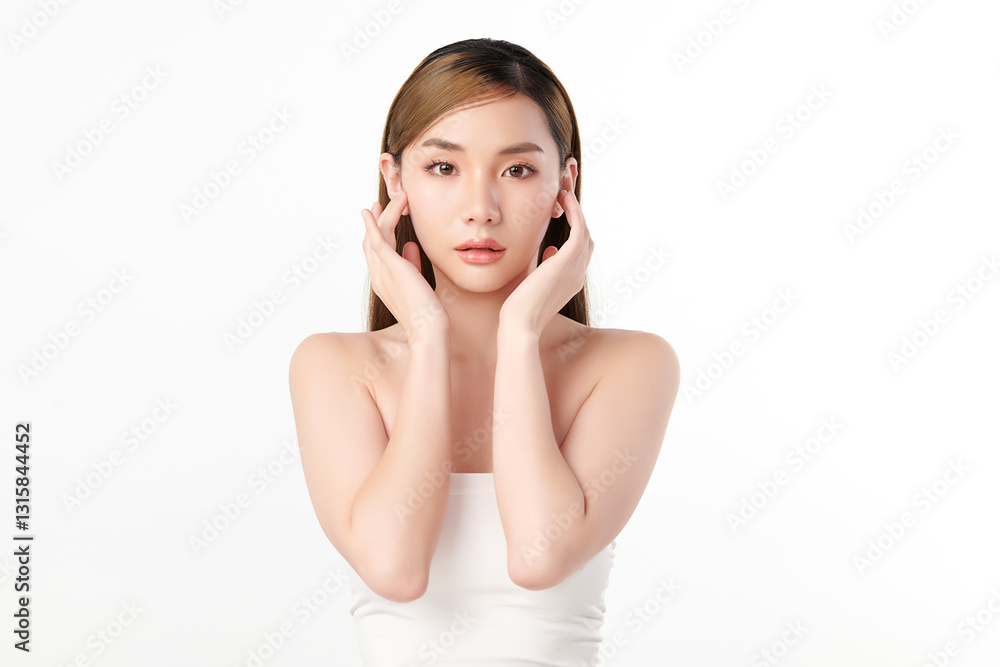 A beautiful young Asian woman with clean, fresh skin against a white background. She represents beauty, skincare, and spa treatments. A beautiful young Asian woman with clean, fresh skin against a white background. She represents beauty, skincare, and spa treatments.