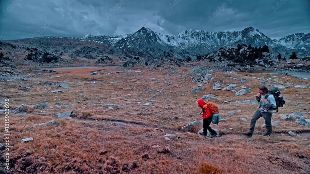 Hiking through the Pyrenees mountains in Spain during overcast weather Hiking through the Pyrenees mountains in Spain during overcast weather