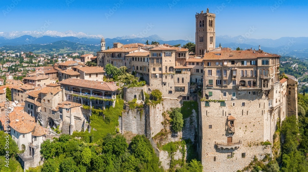Panoramic View of a Historic Castle Overlooking a Picturesque Village Amidst the Mountains in Italy on a Clear Sunny Day Panoramic View of a Historic Castle Overlooking a Picturesque Village Amidst the Mountains in Italy on a Clear Sunny Day
