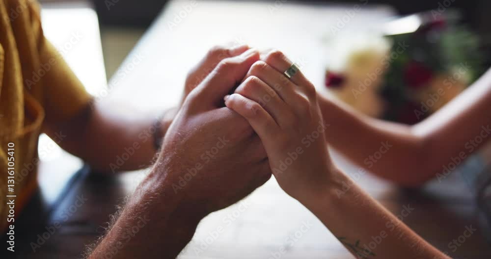 Couple, table and holding hands for romance in relationship, support and affection for bonding. Home, touching and security in connection, marriage partnership and fingers for loving in apartment Couple, table and holding hands for romance in relationship, support and affection for bonding. Home, touching and security in connection, marriage partnership and fingers for loving in apartment