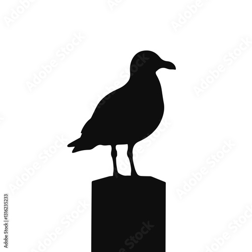 Silhouette of a seagull standing on a post, black and white symbolism