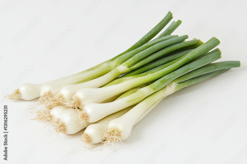 Bunch of fresh green onions displayed diagonally on a white background showcasing vibrant color texture and light Bunch of fresh green onions displayed diagonally on a white background showcasing vibrant color texture and light