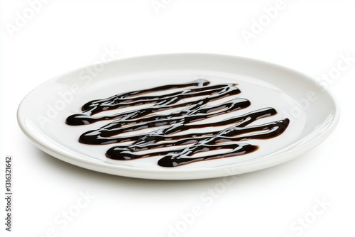 Elegant balsamic glaze on white plate a minimalist food photography capturing sauce texture glossy surface simplicity and culinary art presentation photo