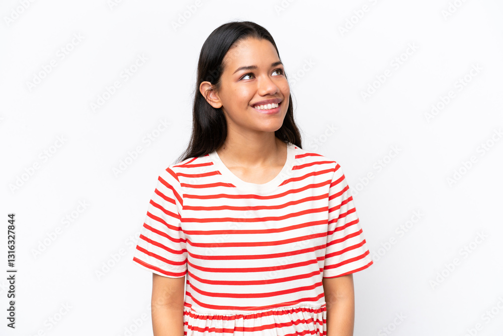 Young Colombian woman isolated on white background thinking an idea while looking up Young Colombian woman isolated on white background thinking an idea while looking up