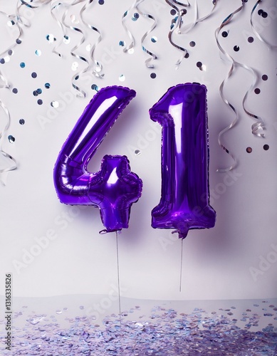 Purple balloon number 41 for forty-first birthday or anniversary party. White background with confetti photo