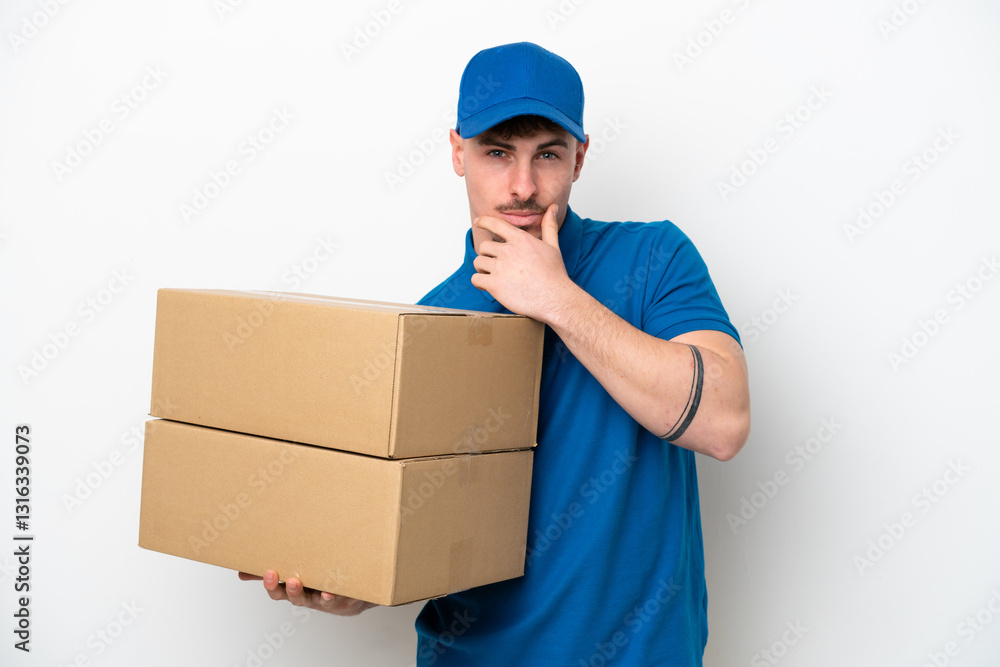 Delivery caucasian man isolated on white background thinking Delivery caucasian man isolated on white background thinking