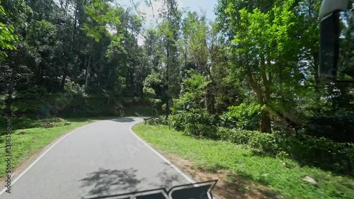 A video of a scenic drive through an Indian forest road during an adventure trip