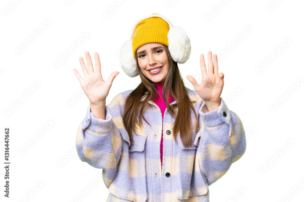 Young woman wearing winter muffs over isolated chroma key background counting nine with fingers Young woman wearing winter muffs over isolated chroma key background counting nine with fingers