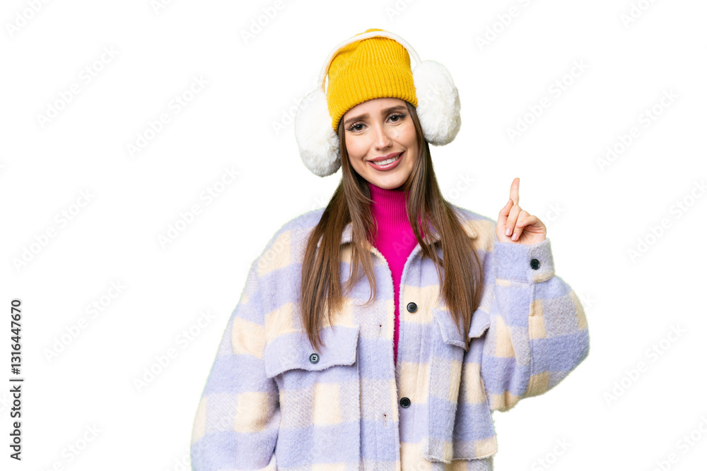 Young woman wearing winter muffs over isolated chroma key background showing and lifting a finger in sign of the best Young woman wearing winter muffs over isolated chroma key background showing and lifting a finger in sign of the best