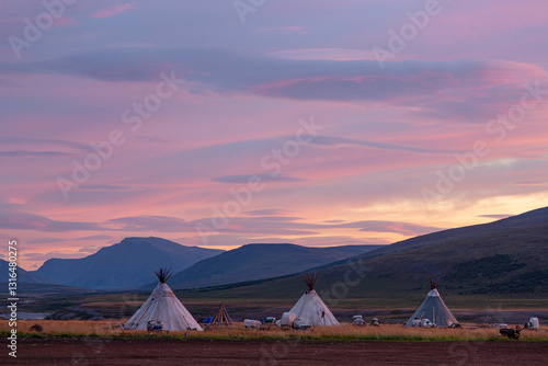 Obraz na płótnie Landscape at sunrise, dwellings of nomads and mountains, Russia, Yamal w salonie
