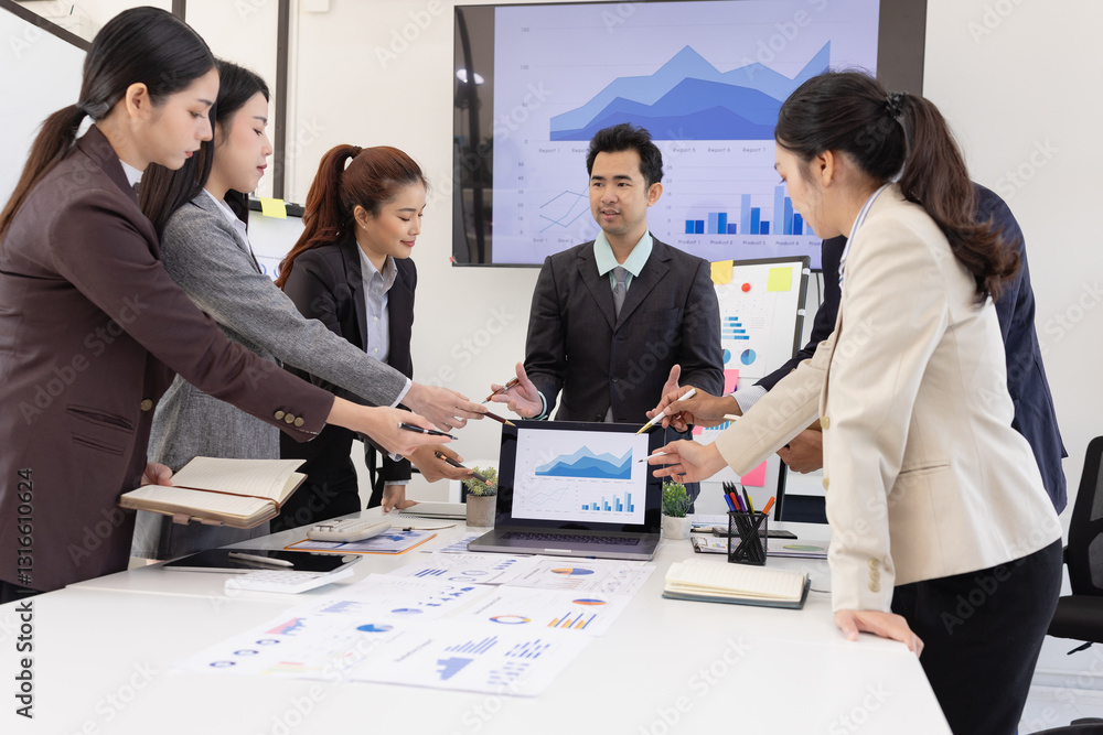Fototapeta premium Group of business people working together with dashboard analysis and data management a meeting table in an office.