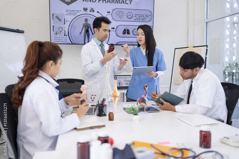 Fototapeta premium Group of Asian doctor working together and brainstorm at the clinic, Healthcare and medical meeting concept.