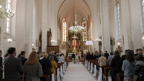 Wedding couple on altar in catholic church 