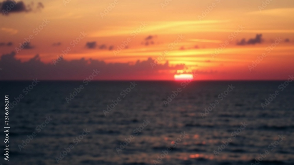 Fototapeta premium Suns descent on sea horizon showcases breathtaking beauty with vibrant colors calm waters and a deep