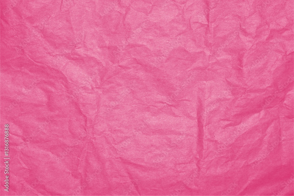 Fototapeta premium Full frame rough texture background of bright pink wrinkled paper.