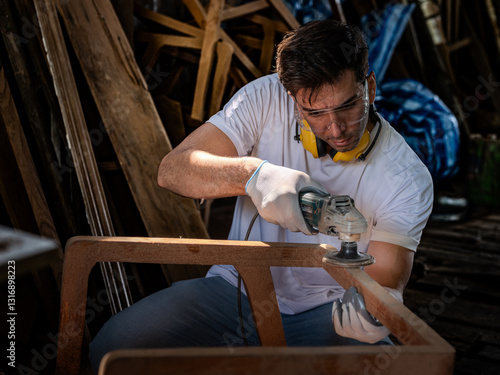 Skilled carpenter working on a woodworking project in his workshop