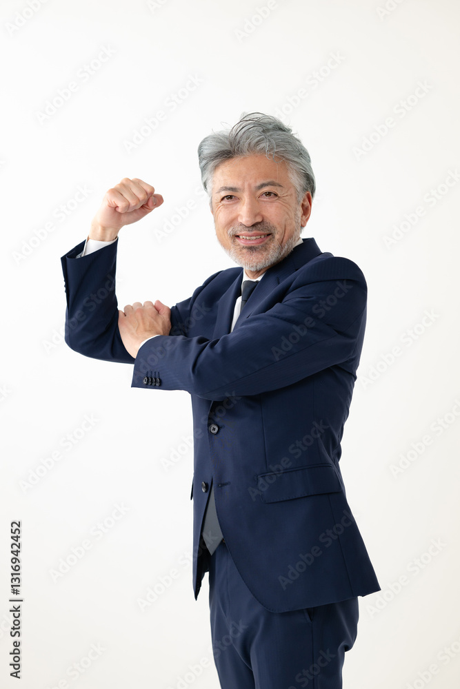 ガッツポーズをするビジネスマン ガッツポーズをするビジネスマン