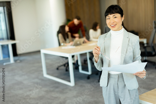Professional Asian woman le...