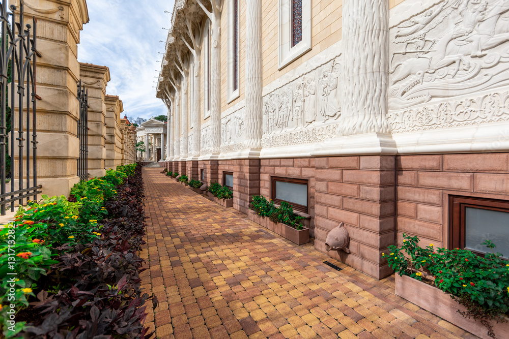 custom made wallpaper toronto digitalA brick walkway with a row of potted plants on either side. The plants are green and the walkway is brown