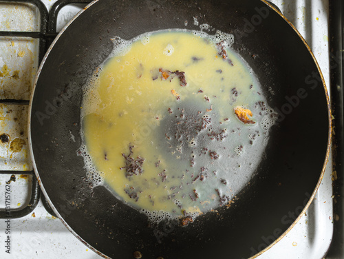 Fotografía A greasy dirty frying pan