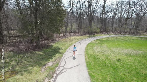 Wallpaper Mural long boarding on a path in a park Torontodigital.ca