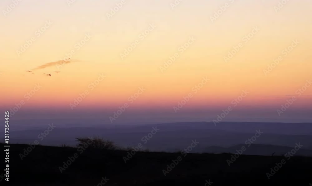 ethereal sunset with a man silhouette walking slowly ethereal sunset with a man silhouette walking slowly