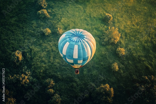 Hot Air Balloon Soaring Over Green Farmland at Sunrise