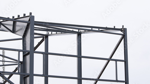 Canvas Print Metal construction, in the photo the structure of the building frame made of met
