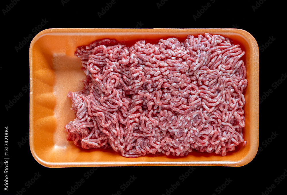 Raw ground meat minced in foam food container. Retail market sale Isolated black background Raw ground meat minced in foam food container. Retail market sale Isolated black background
