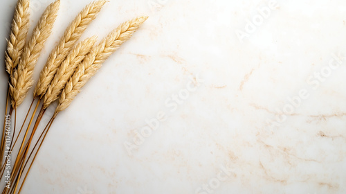 Golden Wheat Stalks on Marble Background