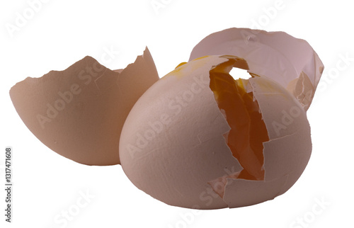 cracked egg with yolk and shell on white background.