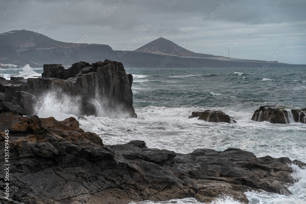 Fototapeta premium Strong waves in El Puertillo. Arucas seascape. Gran Canaria. Canary islands. Spain