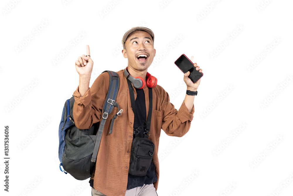 Young Indonesian male traveler happy and excited while listening to music from mobile phone while traveling, travel concept, isolated on white background. Young Indonesian male traveler happy and excited while listening to music from mobile phone while traveling, travel concept, isolated on white background.