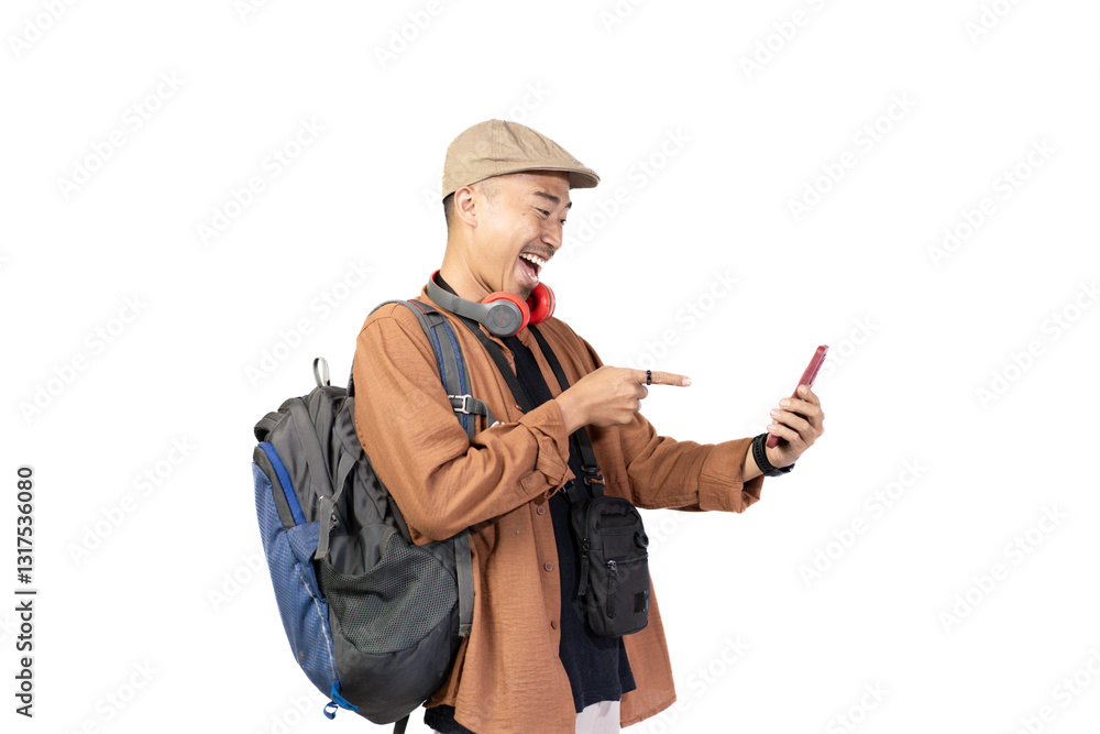 Happy young Indonesian male traveler pointing at mobile phone while traveling, travel concept, isolated on white background. Happy young Indonesian male traveler pointing at mobile phone while traveling, travel concept, isolated on white background.