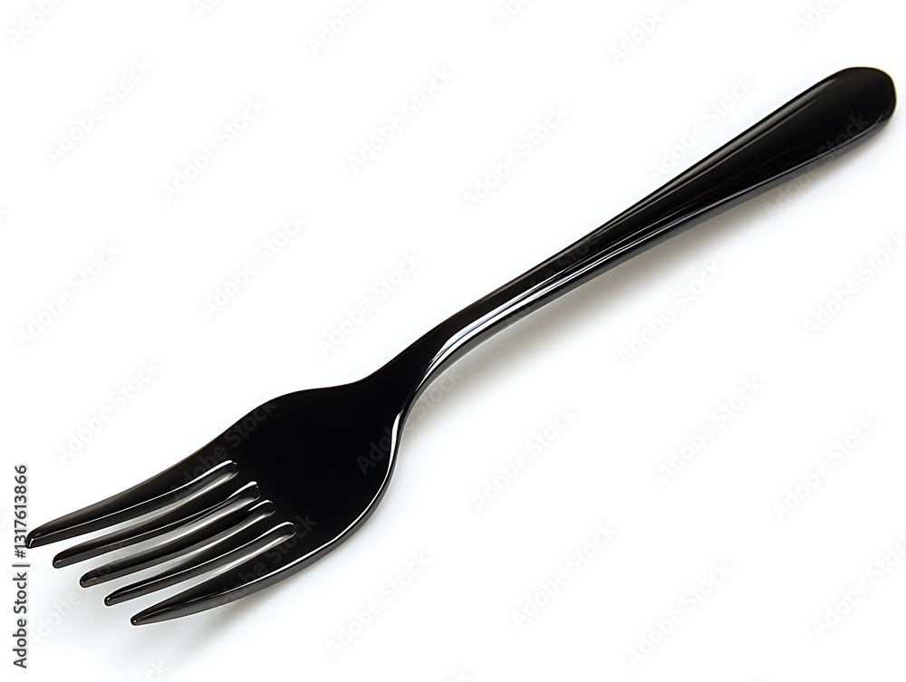A black plastic fork is positioned on a white background A black plastic fork is positioned on a white background