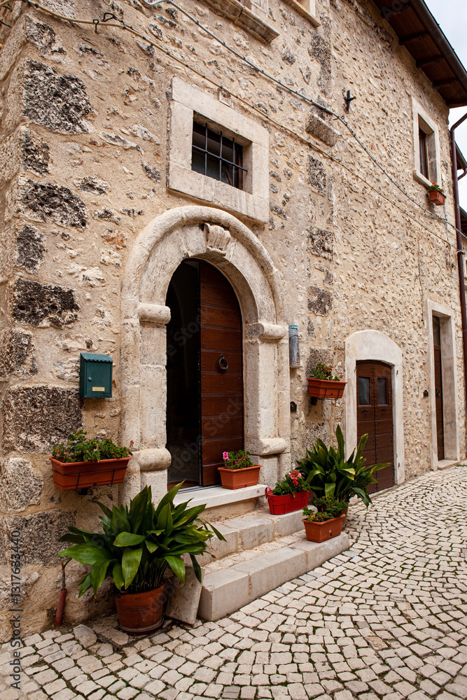 Fototapeta premium The wonderful medieval town of Castel del Monte, nestled in the Abruzzo mountains during autumn, once the tourist season is over