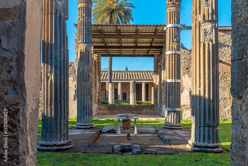 The House of the Labyrinth is a villa or dwelling with a double atrium and a peristyle with four high Corinthian-Italic columns. The interior houses a magnificent mosaic. 