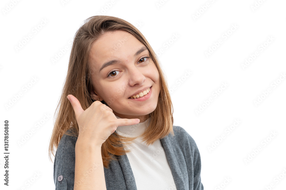 A young woman smiling and making a call gesture with her hand against a white background. A young woman smiling and making a call gesture with her hand against a white background.
