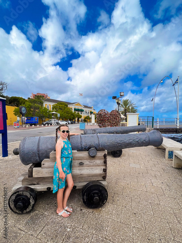 young girl with canon in Willemstad, Curacao