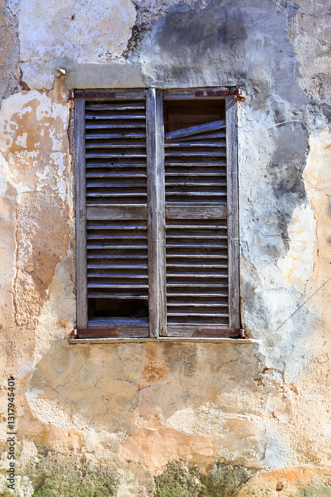 Europe, Spain, Balearic Islands, Mallorca. Wood shuttered window.