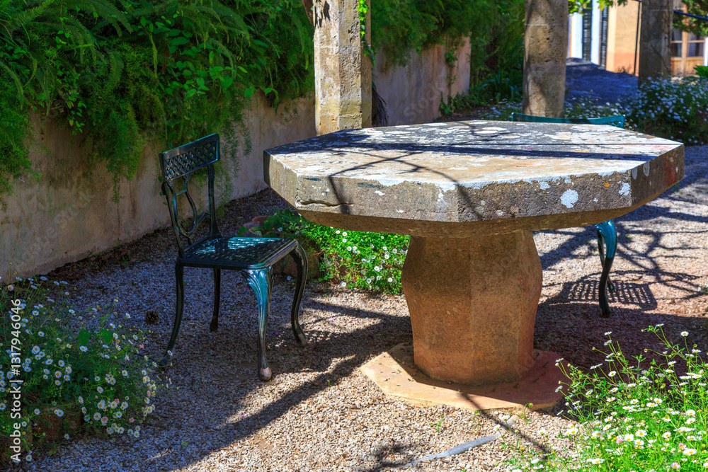 Europe, Spain, Balearic Islands, Mallorca. Esporles. La Granja. Museum. Outdoor table seating. 2017-04-14