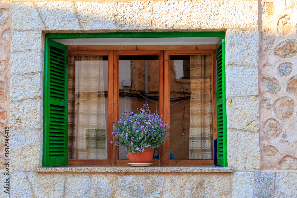 Europe, Spain, Balearic Islands, Mallorca. Window in Esporles.