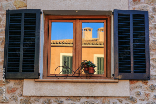 Europe, Spain, Balearic Islands, Mallorca. Esporles, Shuttered windows.