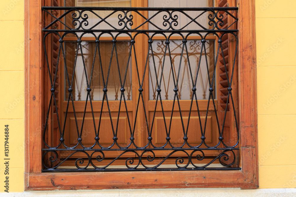 Europe, Spain, Balearic Islands, Mallorca. Decorative bars on window.