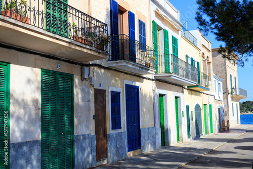 Obraz na płótnie Europe, Spain, Balearic Islands, Mallorca. Porto Colom. Row houses. w salonie